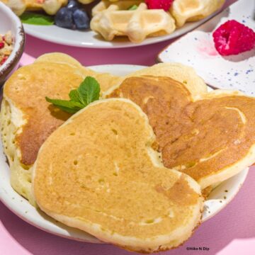 heart shaped pancakes on a white plate
